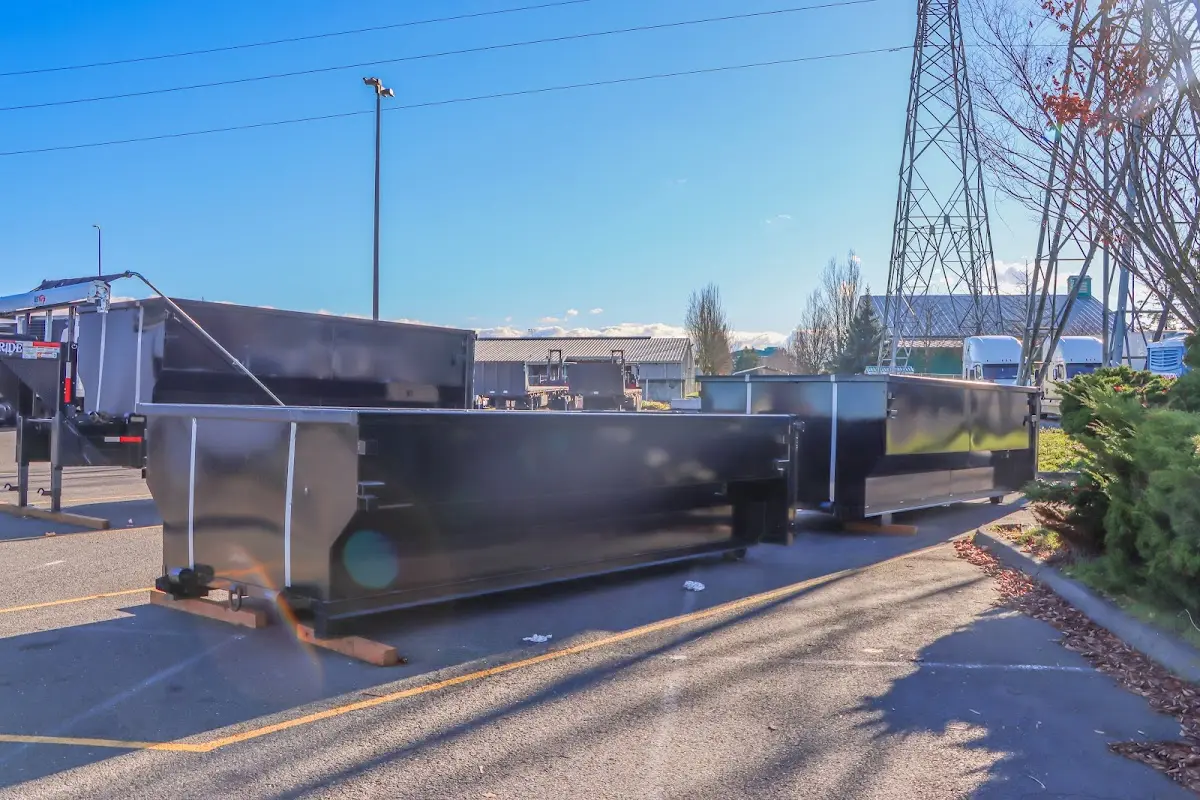 Roll-off dumpster ready for waste disposal at job site for Construction Dumpster Rental in Anamosa